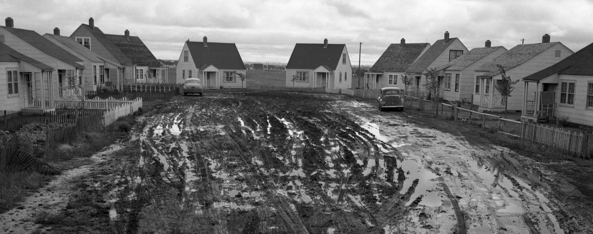 A group of wartime houses at the end of a cul-de-sac.